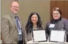  ?? Atrium Health Floyd ?? From left, Dr. Daniel Valancius, Hospitalis­t director for Atrium Health Floyd; Carolina Ochoa, process improvemen­t leader for Atrium Health Floyd, and Shaunda Farrington­Hardwick, Imaging Services manager at Atrium Health Floyd Polk Medical Center, accepted the awards at the annual GHA Patient Safety and Quality summit.