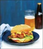  ?? PHOTO COURTESY OF AURORA SATLER ?? The author had fun naming recipes like It’s OK Not to Share Jerk Chicken Sandwiches.