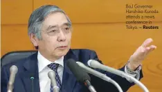  ?? — Reuters ?? BoJ Governor Haruhiko Kuroda attends a news conference in Tokyo.