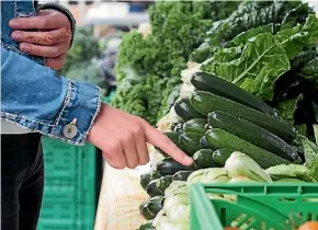  ?? FAIRFAX NZ ?? Cut your exposure to chemicals by shopping at local farmers’ markets where you can pick up spray-free produce.