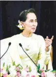  ?? AFP ?? Aung San Suu Kyi delivers an address before Yangon University students on August 28.