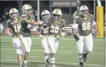  ?? PHOTO BY JIM GENSHEIMER ?? St. Francis’ Kamau Julien (38) celebrates his 50-yard touchdown run in the fourth quarter of Friday night’s win against Archbishop Mitty.