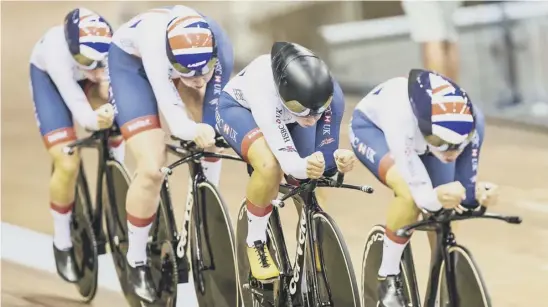  ??  ?? Great Britain’s Elinor Barker, Neah Evans, Katie Archibald and Laura Kenny ride on their way to winning gold in the women’s team pursuit at the Sir Chris Hoy Velodrome in Glasgow.