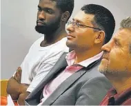  ??  ?? Atlanta. El pastor evangélico Wilmer Cruz, al escuchar los cargos en su contra en un tribunal, el lunes.