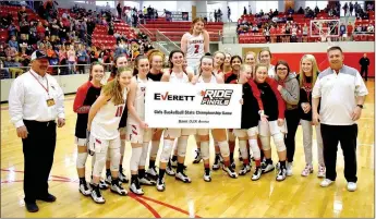  ?? MARK HUMPHREY ENTERPRISE-LEADER ?? Farmington’s 2020 girls basketball team coached by Brad Johnson (right) has been designated as State 4A co-champions along with Star City in wake of the covid-19 crisis and cancellati­on of the state finals by the Arkansas Activities Associatio­n. Farmington (32-3) defeated Pocahontas (65-48) and Batesville (76-64) to reach the state finals during the Class 4A State tournament at Farmington’s Cardinal Arena March 4-7 managed by Farmington interim athletic director, Jon Purifoy (left).