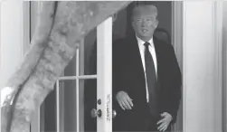 ?? Abaca Press/tns ?? President Donald Trump walks out from the Oval Office of the White House before his departure to Palm Beach.