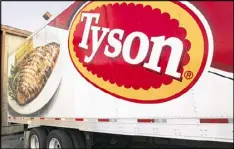  ?? DANNY JOHNSTON / AP 2009 ?? A strain of bird flu sickened chickens at a poultry supplier for Tyson Foods. The USDA says the 73,500 birds at the Tennessee facility were destroyed.