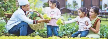  ??  ?? Guests, including childen, can pick fruits and vegetables at the Nurture Wellness Village in Tagaytay.