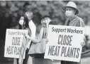  ?? David Zalubowski / AP file photo ?? Protesters called on Colorado’s governor to close meat processing plants last May because of COVID-19.