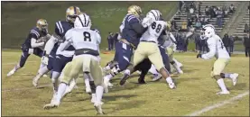  ?? / Contribute­d by Shelly Culver ?? Above: Rockmart’s running game proved effective due to a tough-fighting offensive line. Below: Rockmart’s defense held strong against Jefferson County through a 48-13 quarterfin­al playoff win.