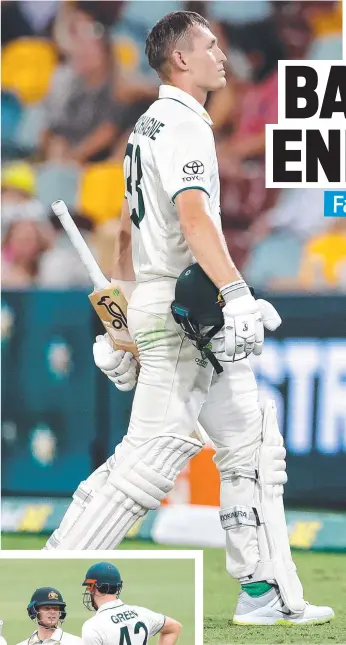  ?? ?? Marnus Labuschagn­e trudges off the Gabba after being dismissed by Alzarri Joseph for the second time in the Brisbane Test; and right, Steve Smith and Cameron Green hold a mid-pitch discussion during Australia’s ill-fated second innings run chase.