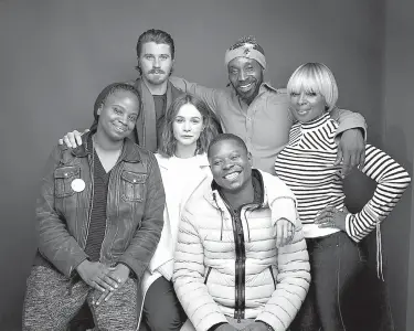  ?? Photo by Taylor Jewell/Invision/AP, File ?? Director Dee Rees, clockwise from left, actors Garrett Hedlund, Rob Morgan, Mary J. Blige, Jason Mitchell and Carey Mulligan, middle row center, pose for a portrait Jan. 21 to promote the film “Mudbound” during the Sundance Film Festival in Park City,...