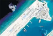  ??  ?? The under-constructi­on airstrip on the Fiery Cross Reef in the South China Sea. FILE PHOTO