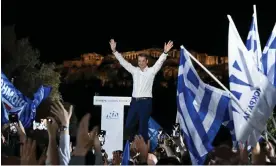  ?? Photograph: Aris Messinis/AFP/Getty Images ?? Mitsotakis at his last election rally on Saturday, in front of the Acropolis.