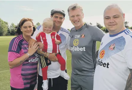  ??  ?? Jasmine Purvis with parents Jamie Harvey, dad Chris Purvis, left, grandad Colin Hope, right, and David Moyes.