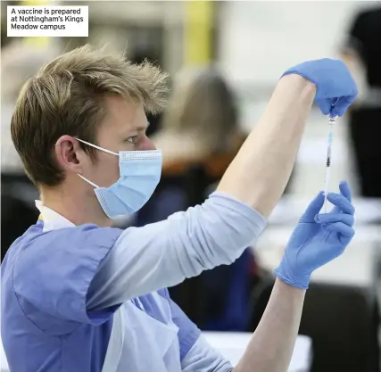  ??  ?? A vaccine is prepared at Nottingham’s Kings Meadow campus