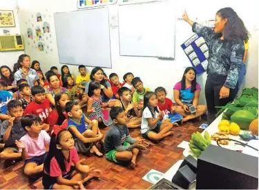  ??  ?? The learning center teaches farming to kids in order to instill a sense of responsibi­lity along with other skills like patience and determinat­ion. (Photo courtesy of AHA!)