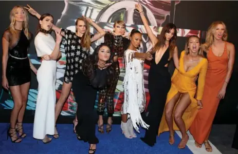  ?? MATT SAYLES/INVISION/THE ASSOCIATED PRESS FILE PHOTO ?? Taylor Swift and her girl squad, all of whom appeared in her “Bad Blood” music video, arrive at the MTV Video Music Awards.
