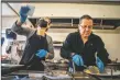  ?? ?? Owners Yamil Isbak, right, and wife Mary Adame work together in the kitchen to serve authentic Mexican flavors to customers on Tuesday (March 8) at Jalapeños Tacos & More.