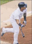  ?? KATHY WILLENS - THE ASSOCIATED PRESS ?? New York Yankees shortstop Gleyber Torres drops the bat as he watches his two-run double in the eighth inning of a baseball game against the Baltimore Orioles, Sunday, Sept. 13, 2020, at Yankee Stadium in New York.