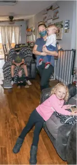  ?? Shelly Thorene / Union Democrat ?? Triplets (top, from left) Kinsley, Kasyn and Kaylie celebrated their 1st birthday on Wednesday. Kasie Hart gets some help with two of her triplets from 3-year-old daughter Jamasyn and 15-year-old son Treydan.