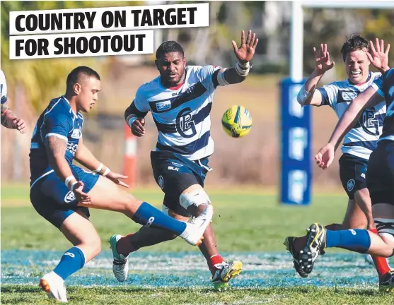  ?? STICK ‘ EM UP: Queensland County’s Duncan Pala- aua kicks as Melbourne’s Isi Nalsarani attempts a chargedown during yesterday’s match. Pictures: ALIX SWEENEY ??