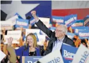  ?? AP PHOTO/ERIC GAY ?? Democratic presidenti­al candidate Sen. Bernie Sanders, I-Vt., right, with his wife Jane, speaks during a campaign event in San Antonio, on Saturday,.