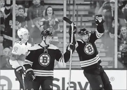  ?? MICHAEL DWYER/AP PHOTO ?? Nick Holden of the Bruins (44) celebrates his goal during the first period of Saturday’s game against the Panthers at Boston.