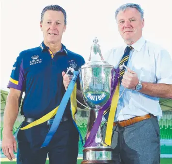  ?? Picture: MICHAEL DODGE/GETTY ?? BIG GAME: Melbourne Storm coach Craig Bellamy and Leeds Rhino's CEO Gary Hetheringt­on pose with the World Club Challenge Trophy yesterday.