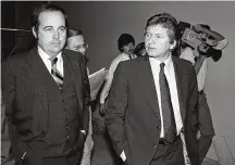  ?? JOHN DURICKA / AP ?? Rep. John Jenrette, D-S.C. (right) and his lawyer Kenneth Robinson in Washington, in 1980. Jenrette, who was part of the Abscam political corruption case that brought down seven members of Congress, died on March 17 in Conway, S.C. He was 86.