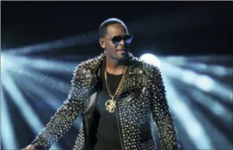  ?? PHOTO BY FRANK MICELOTTA — INVISION — AP, FILE ?? This month the streaming service Spotify announced it would remove music R. Kelly and rapper XXXtentaci­on from its playlists, citing the new policy on hate content and hateful conduct.