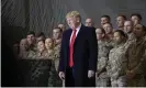  ?? Photograph: Alex Brandon/AP ?? Donald Trump smiles before addressing members of the military during a surprise Thanksgivi­ng Day visit at Bagram Air Field, Afghanista­n, in 2019.