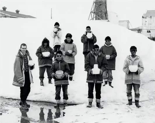  ??  ?? BELOW
Back: Eli Tikeayak,
Charlie Panigoniak
Middle: John Kavik, Michael Angutituak, John Okalik Front: Claude Grenier, Laurent Aksadjuak, unidentifi­ed,
Yvo Samgushak in Kangiqlini­q, 1965.
PHOTO GEORGE SWINTON COURTESY UNIVERSITY OF MANITOBA ARCHIVES