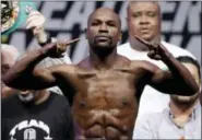  ?? THE ASSOCIATED PRESS FILE PHOTO ?? Boxer Floyd Mayweather Jr. will face UFC star Conor McGregor in a boxing match on Aug. 26.
