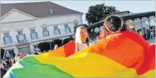  ?? Picture: REUTERS ?? Demonstrat­ors attend a protest against a law that bans LGBTQ content in schools and media at the Presidenti­al Palace in Budapest, Hungary.