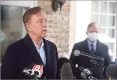  ?? H John Voorhees III / Hearst Connecticu­t Media ?? Gov. Ned Lamont said the new federal stimulus would bring stability to individual­s and businesses in Connecticu­t.