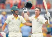  ?? AFP ?? Travis Head (right) and Joe Burns put on a record 308 runs for the fourth wicket against Sri Lanka, at the Manuka Oval on Friday.