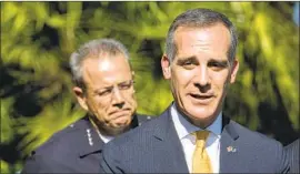  ?? Mel Melcon Los Angeles Times ?? MAYOR ERIC GARCETTI and LAPD Chief Michel Moore, seen in 2019, put some of the blame for a recent spate of thefts on justice reforms.