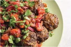  ?? (Milk Street via AP) ?? Spicy Ground Beef Kebabs with Tomato-Sumac Sauce.