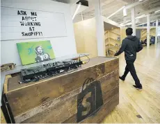  ?? KEVIN VAN PAASSEN/BLOOMBERG FILES ?? A worker at Shopify Inc.’s headquarte­rs in Toronto. Shopify flaunted its achievemen­ts in “helping businesses start, succeed and scale” following Citron Research’s criticisms.