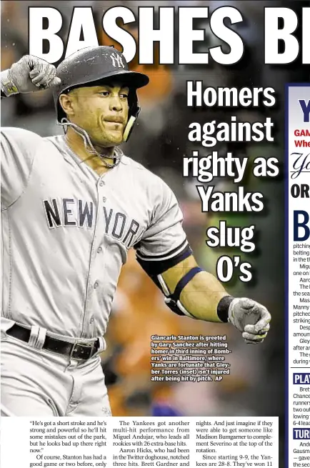  ??  ?? Giancarlo Stanton is greeted by Gary Sanchez after hitting homer in third inning of Bombers’ win in Baltimore, where Yanks are fortunate that Gleyber Torres (inset) isn’t injured after being hit by pitch. AP