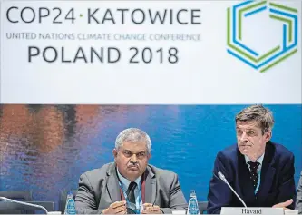  ?? STR THE ASSOCIATED PRESS ?? Norwegian CEO Haavard Gulbrandse­n, right and Satya Tripathi attend a debate on "Aligning financial systems with the climate goals of the Paris agreement" during UN climate talks.