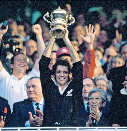  ??  ?? Historic moment: David Kirk becomes the first man to lift the Webb Ellis Cup after New Zealand beat France in the 1987 final