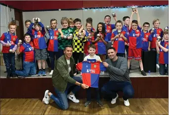  ?? ?? The Norries 2014s with their new kits alongside Stjärna Apparel’s Mikey Mlotkiewic­z and 2014s coach Matthew Kilgour