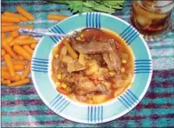  ?? PHOTOS BY KEITH SUTTON/CONTRIBUTI­NG PHOTOGRAPH­ER ?? Rabbit can be prepared in a variety of delicious recipes like this stew.