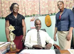  ??  ?? From left: Guidance Counsellor Arene Berry- Henry, Principal Gerald Lawrence and vice- principal Sheryl Mitchell – Anchovy Primary School administra­tors.