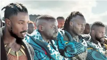  ?? Film Frame / Marvel Studios ?? ERIK KILLMONGER (Michael B. Jordan, from left) and W’Kabi (Daniel Kaluuya) in “Black Panther,” written by Joe Robert Cole and director Ryan Coogler.