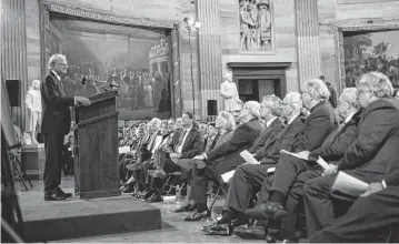  ?? Billy Graham Evangelist­ic Associatio­n ?? Surrounded by the congressio­nal statues, Billy Graham speaks to political leaders at his Congressio­nal Gold Medal ceremony in 1996. The Grahams were the 114th recipients of Congress’ highest civilian honor.