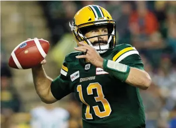  ?? DAVID BLOOM ?? Columnist Rob Vanstone doesn’t believe quarterbac­k Mike Reilly, shown in action for the Edmonton Eskimos last season, would be inclined to sign with the Saskatchew­an Roughrider­s.