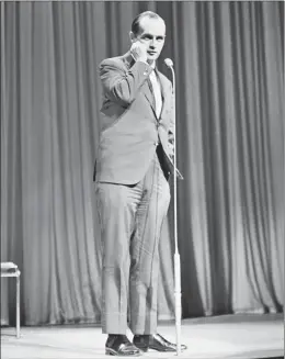  ?? DAILY EXPRESS/HULTON ARCHIVE ?? Comedian and actor Bob Newhart performs at the Palladium in London in 1964. His debut comedy album, “The Button-Down Mind of Bob Newhart,” was released on May 6, 1960.